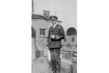 The Captain, Commander Herival OBE